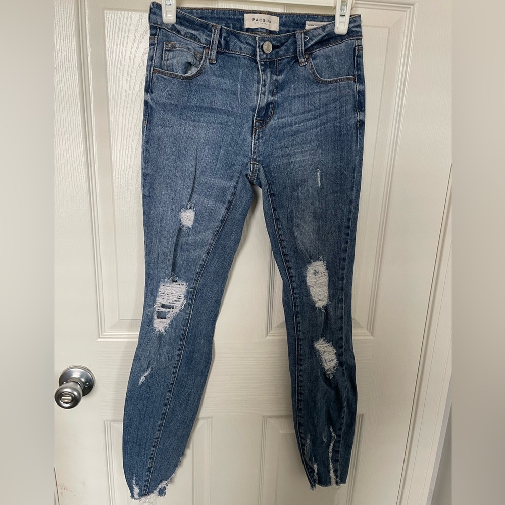 Blue Mid Rise Ripped Jeans